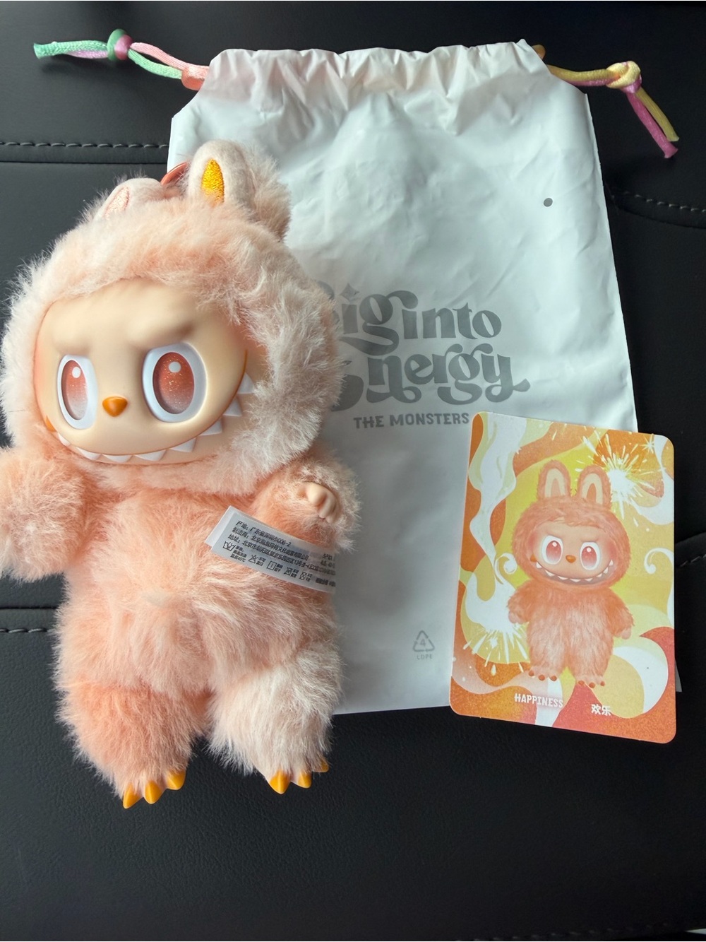 Labubu authentic from pop mart- big into Energy The Monsters - Peach/White